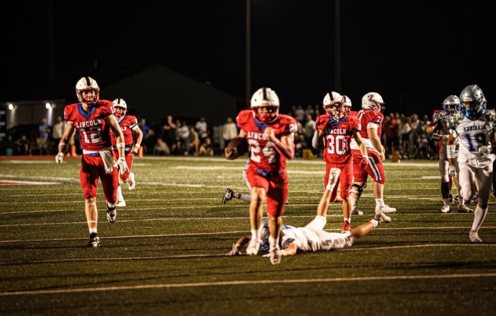 Reed Curlis runs to daylight. Photo Courtesy of SERG Photography.